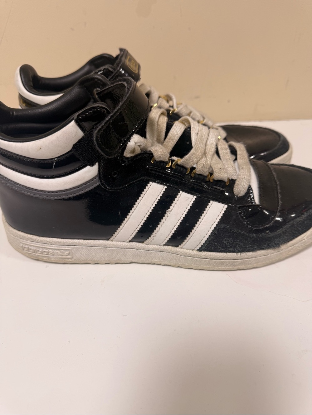 adidas Black and White High-Top Sneakers with Gold Eyelets